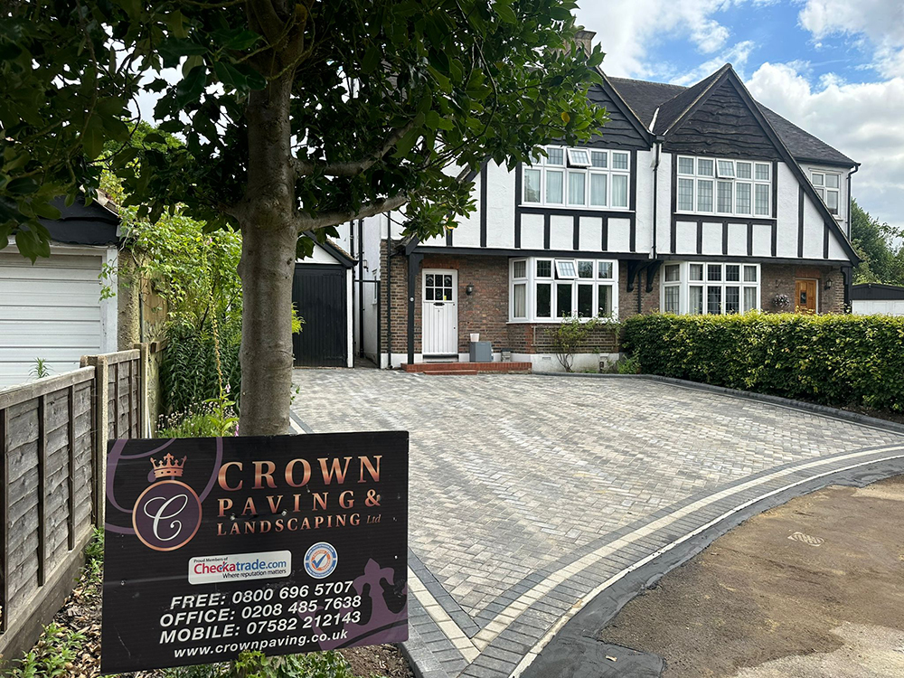 Completed grey block paving driveway in Reigate